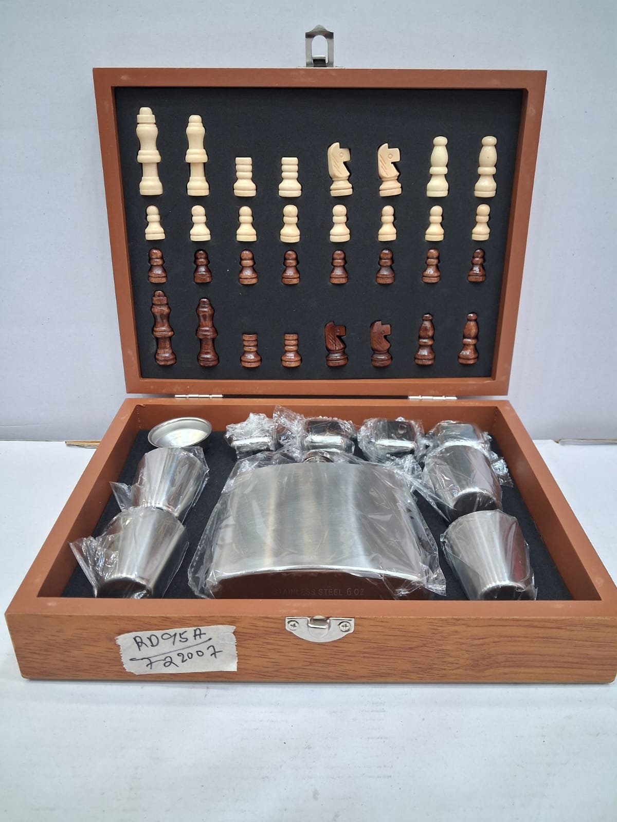 Hip flask with chess steel finish